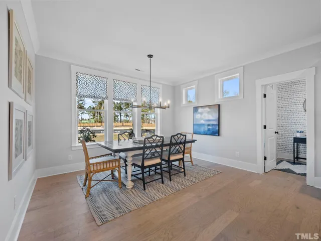 a work room with furniture and a window
