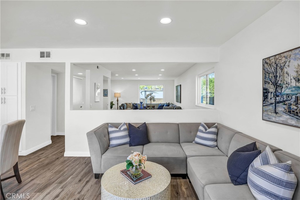 4345 Larwin Avenue Cypress, CA 90630 - Photo 18 of 54 a living room with furniture and kitchen view