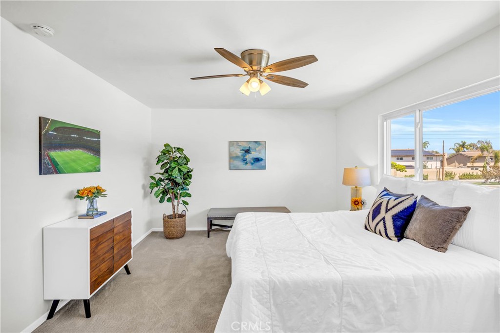 4345 Larwin Avenue Cypress, CA 90630 - Photo 20 of 54 a bedroom with a bed and window