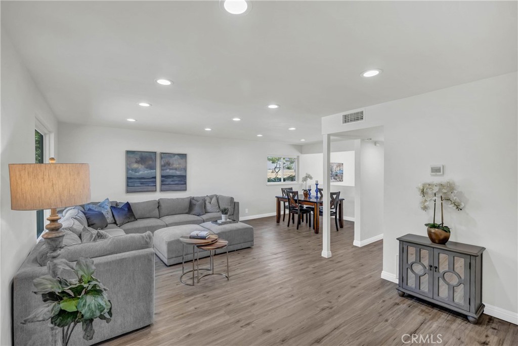 4345 Larwin Avenue Cypress, CA 90630 - Photo 2 of 54 a living room with furniture and wooden floor