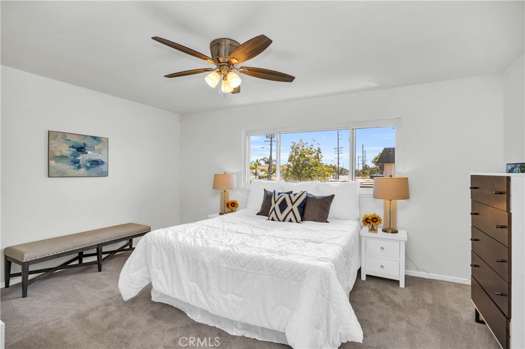 4345 Larwin Avenue Cypress, CA 90630 - Photo 22 of 54 a bedroom with a bed furniture and a window
