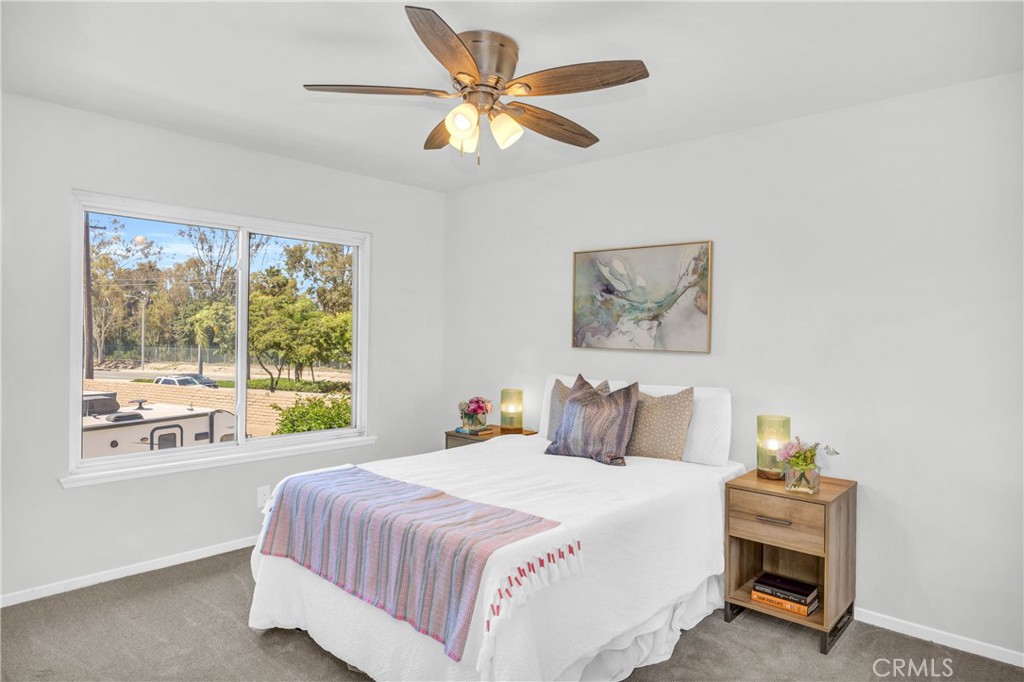 4345 Larwin Avenue Cypress, CA 90630 - Photo 29 of 54 a bedroom with a bed and a large window