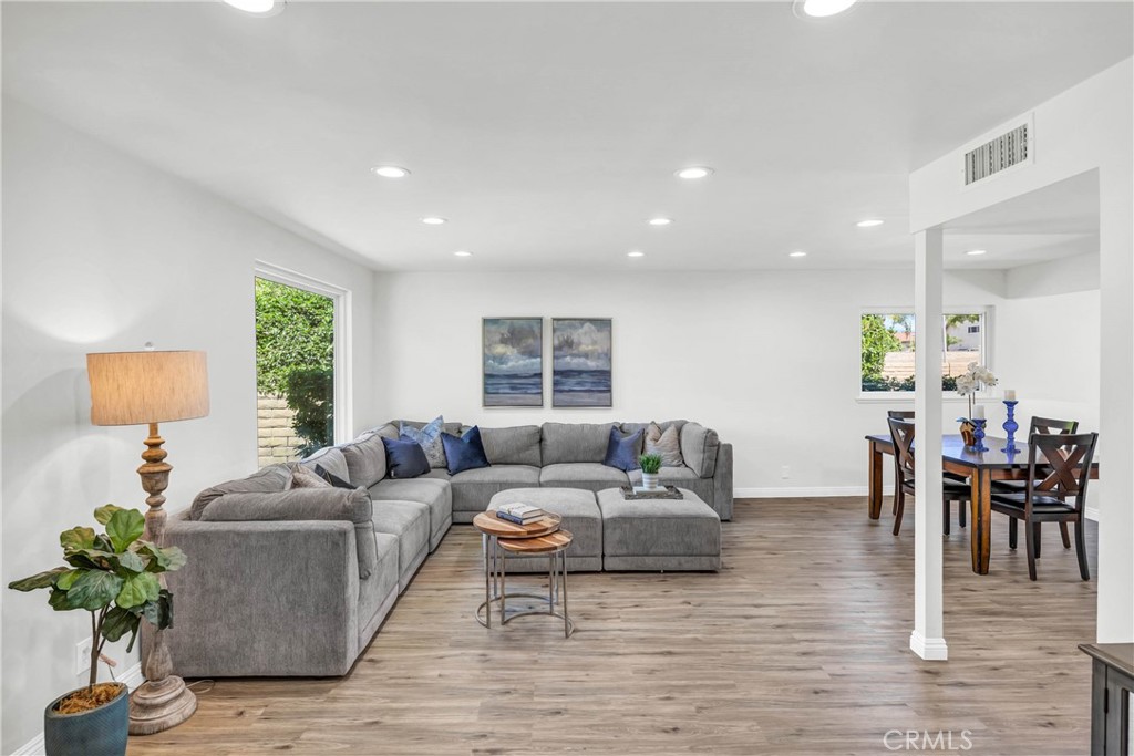 4345 Larwin Avenue Cypress, CA 90630 - Photo 3 of 54 a living room with furniture and a wooden floor