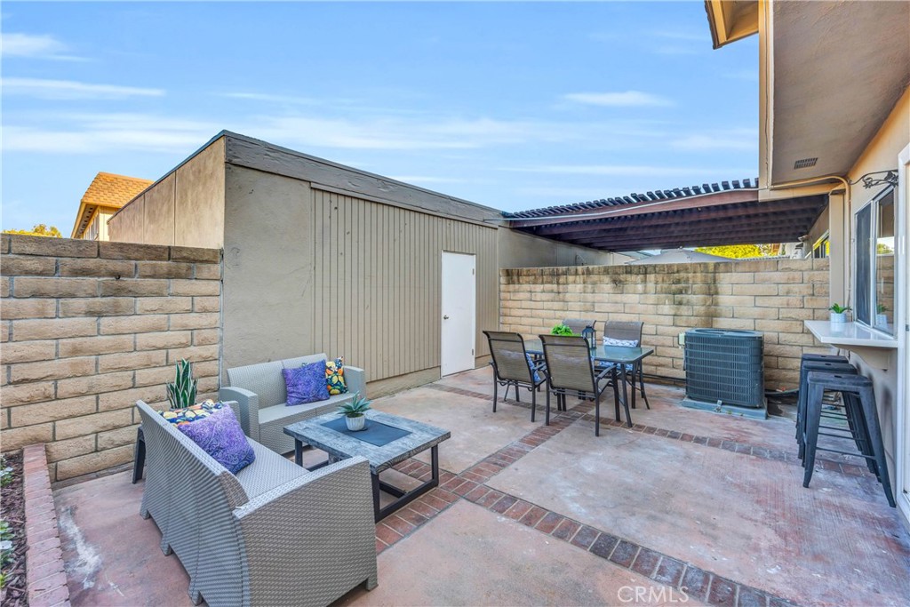 4345 Larwin Avenue Cypress, CA 90630 - Photo 37 of 54 a patio with patio couch and table