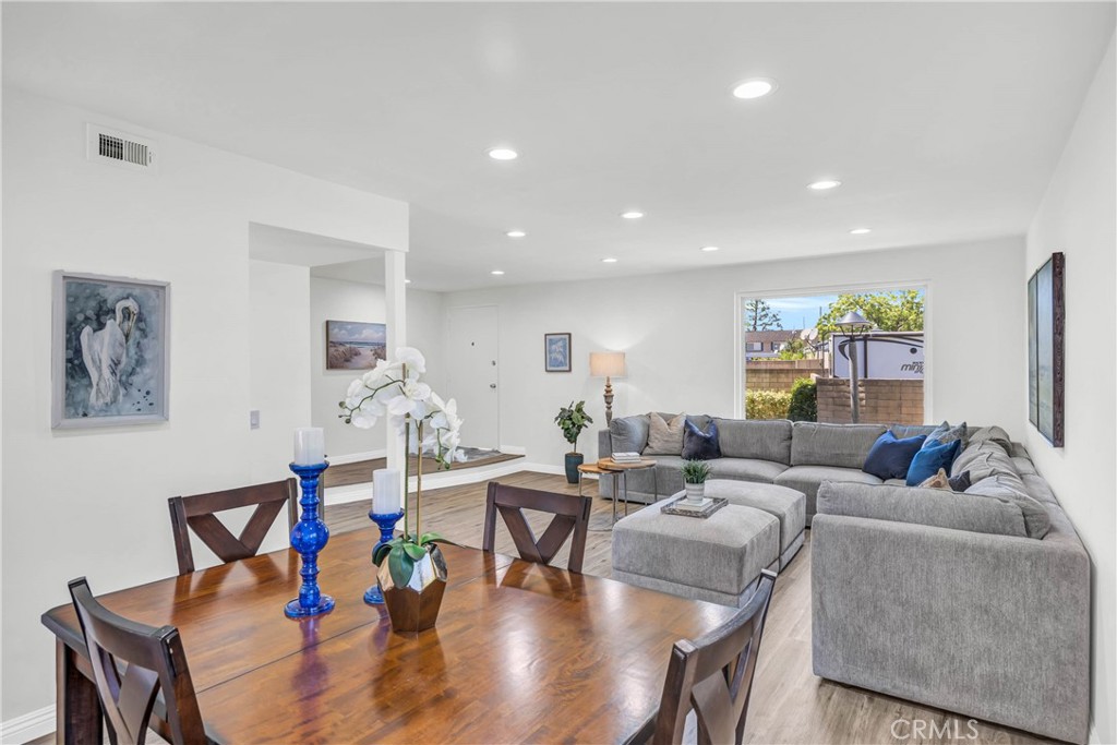 4345 Larwin Avenue Cypress, CA 90630 - Photo 5 of 54 a living room with furniture and wooden floor