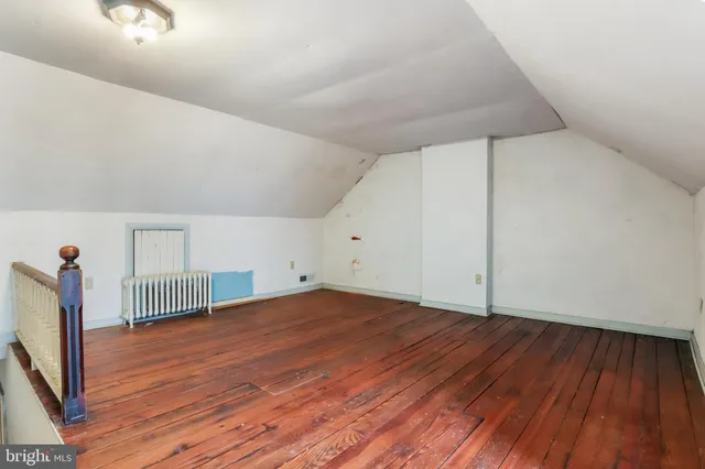 a view of a livingroom with wooden floor