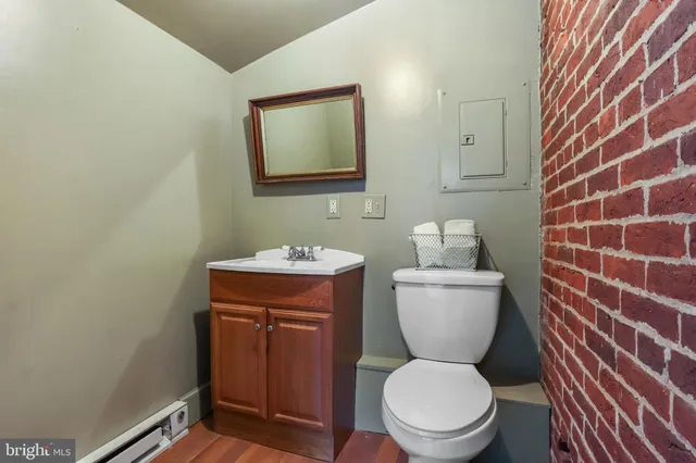 a view of a entryway with furniture and floor to ceiling window