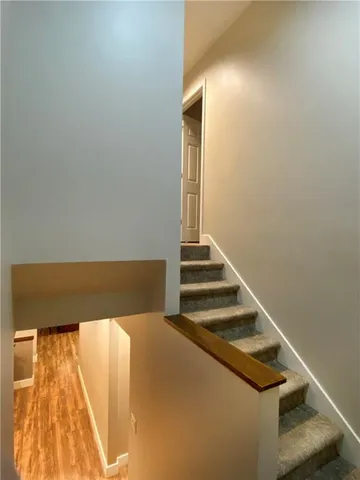 a bedroom with a bed and furniture