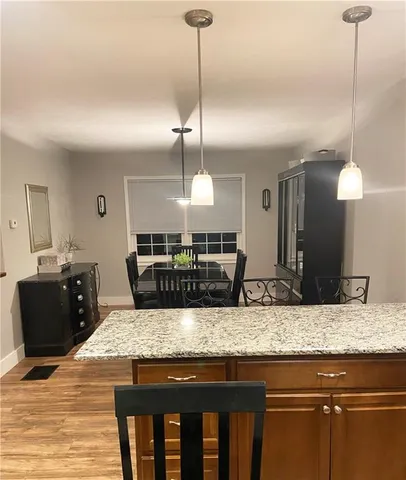 a bathroom with a shower and a toilet