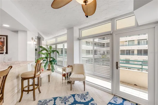 a kitchen with stainless steel appliances granite countertop a refrigerator and stove