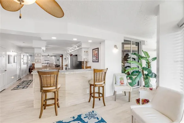 a kitchen with stainless steel appliances granite countertop a sink and a granite counter tops