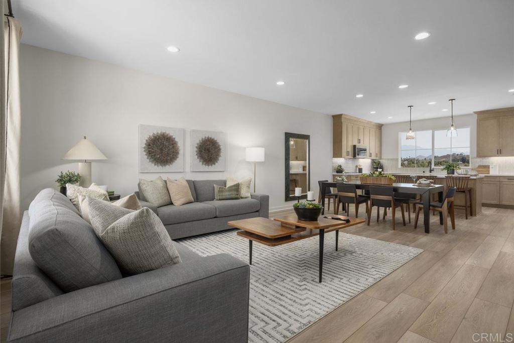 4600 Catmint Lane Carlsbad, CA 92008 - Photo 2 of 9 a living room with furniture and kitchen view