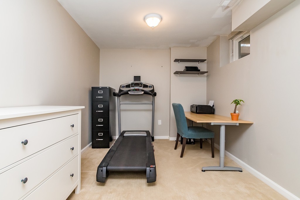 95 Anderer Lane, Unit 4 Boston, MA 02132 - Photo 15 of 22 a view of a workspace with furniture