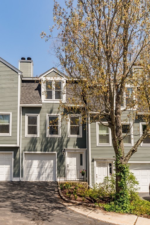 95 Anderer Lane, Unit 4 Boston, MA 02132 - Photo 18 of 22 a front view of a house with a yard
