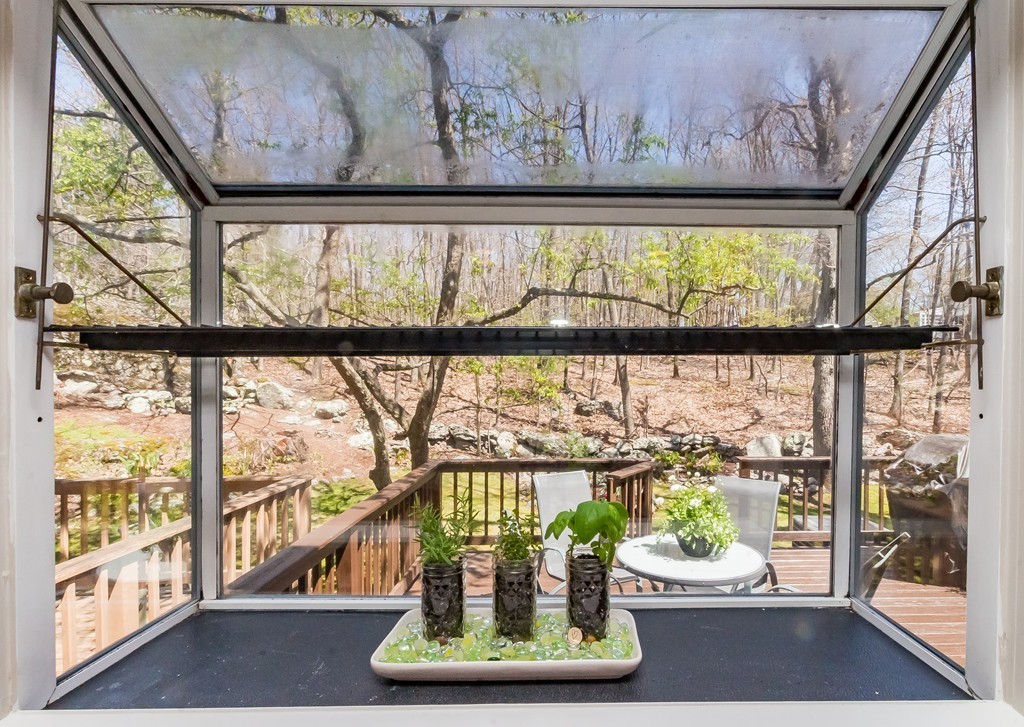 95 Anderer Lane, Unit 4 Boston, MA 02132 - Photo 4 of 22 a view of city from a window