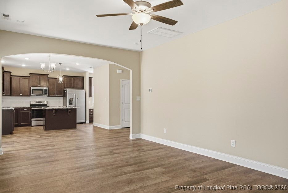 4830 Quiet Pine Road Fayetteville, NC 28314 - Photo 19 of 50 a view of kitchen with granite countertop cabinets and refrigerator