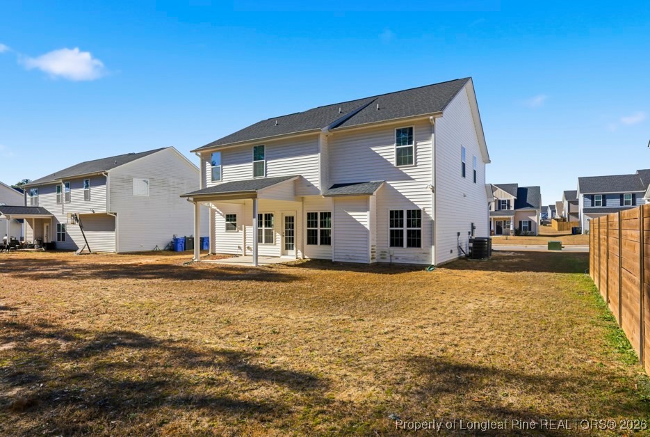 4830 Quiet Pine Road Fayetteville, NC 28314 - Photo 49 of 50 a front view of a house with a yard