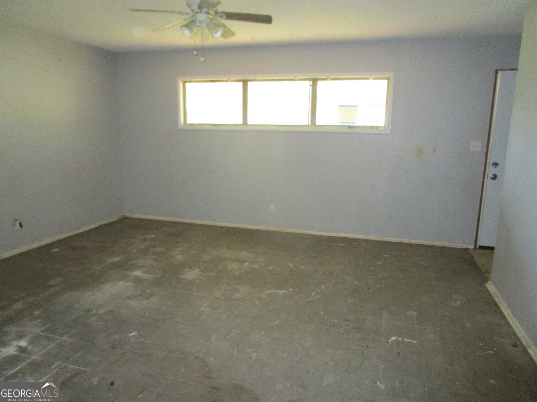 3480 Travis Boulevard Macon, GA 31206 - Photo 3 of 11 an empty room with a window