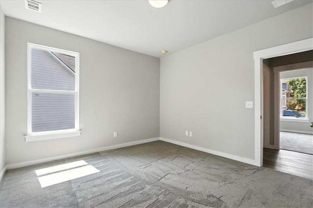4022 Links Boulevard Jefferson, GA 30549 - Photo 22 of 54 an empty room with windows