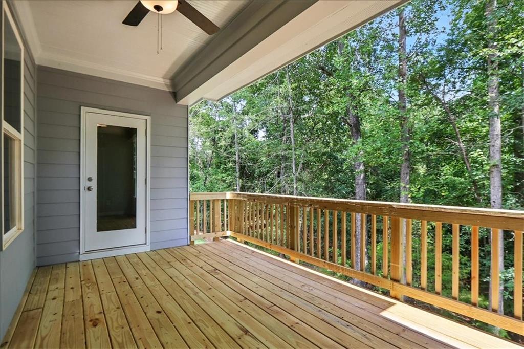 4022 Links Boulevard Jefferson, GA 30549 - Photo 44 of 54 a view of balcony with wooden floor