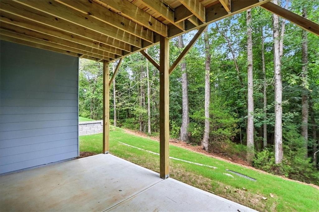 4022 Links Boulevard Jefferson, GA 30549 - Photo 50 of 54 a view of a room with porch and a backyard