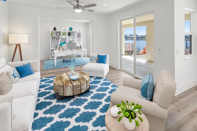 a living room with furniture and a rug