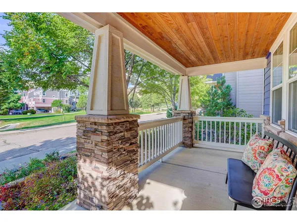 a view of a porch with a swing