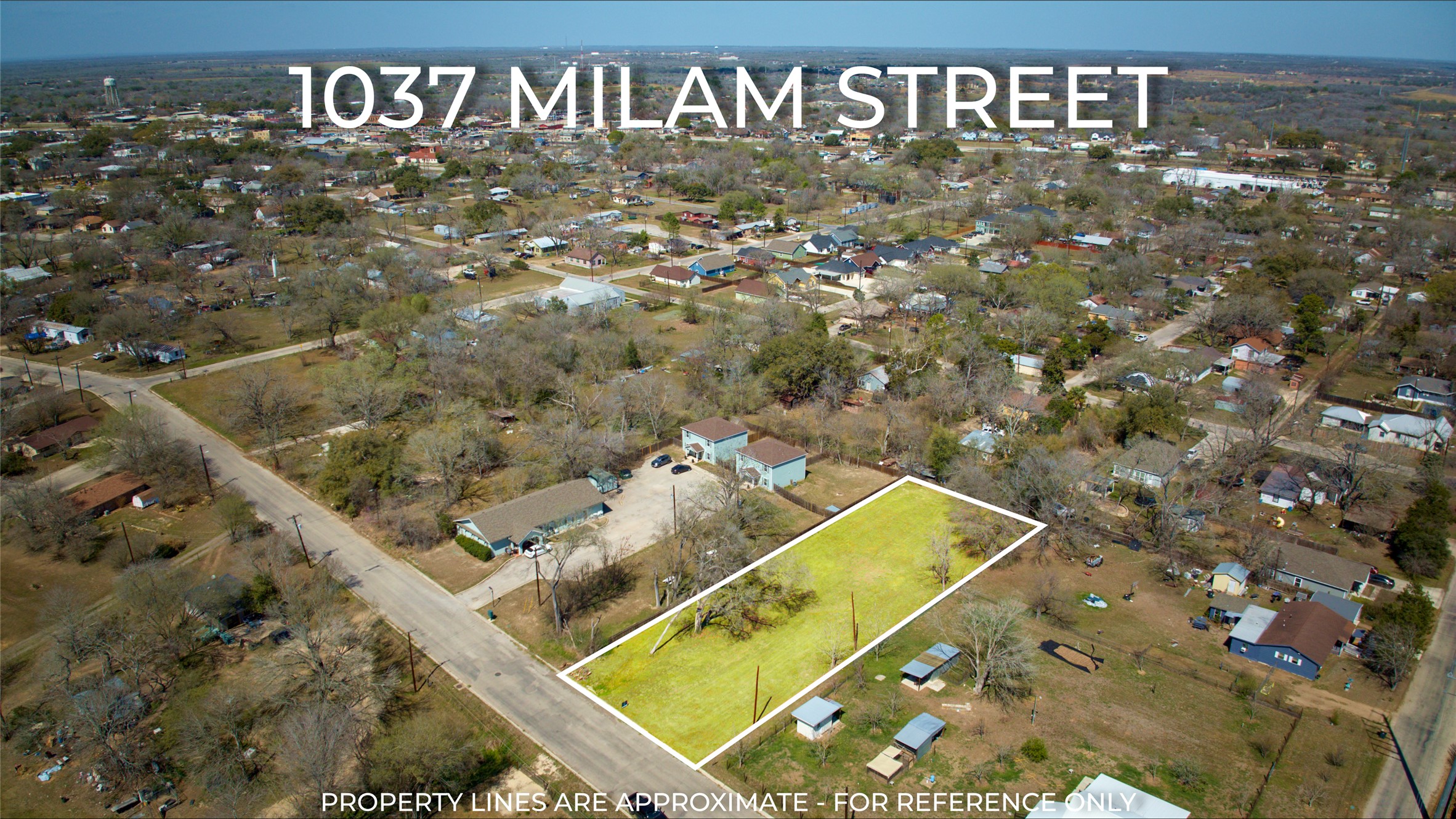 1037 East Milam Street Luling, TX 78648 - Photo 11 of 17 Aerial overview of property's location featuring property boundaries highlighted