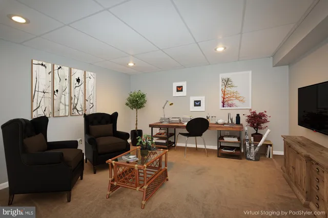a room with pool table and windows