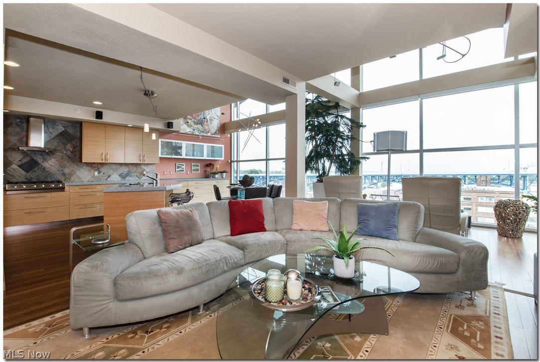 1237 Washington Avenue, Unit 1209 Cleveland, OH 44113 - Photo 12 of 33 PALM WOOD FLOORS, SUPERIOR CUST KITCHEN CABINETRY, CUST GRANITE COUNTERTOPS, SOARING 16' WALL TO WALL WINDOWS, GRACE THIS STUNNING PENTHOUSE