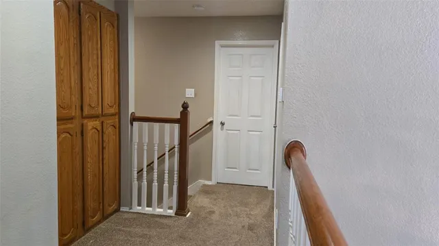 a view of an entryway with staircase