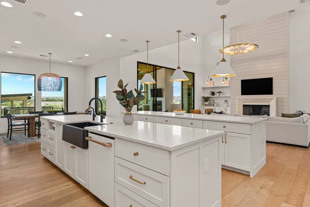 a aerial view of a house with swimming pool and yard