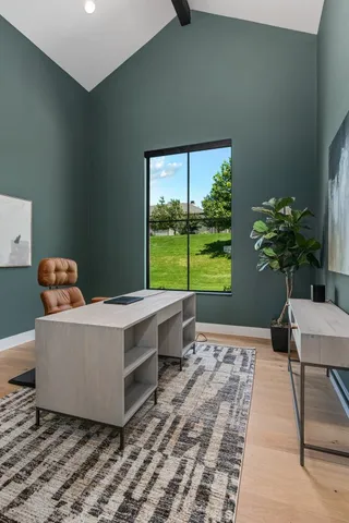 a bathroom with a granite countertop sink two mirror and shower