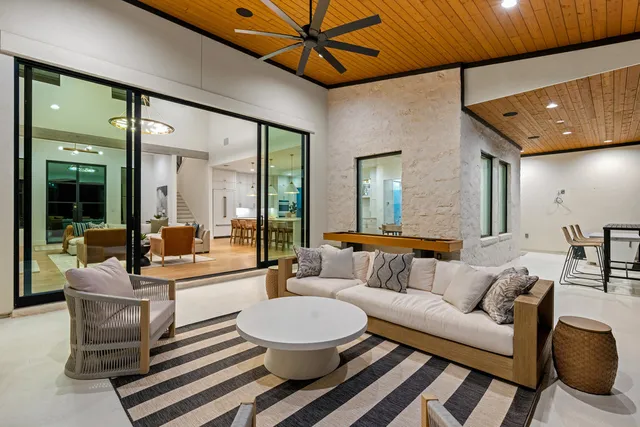 a bathroom with a sink vanity and toilet