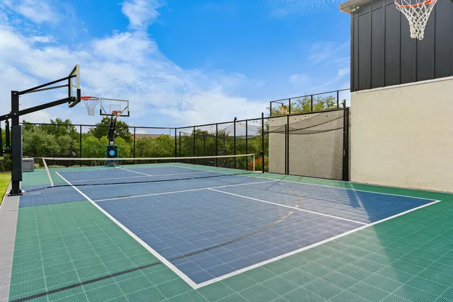 a view of swimming pool with a yard