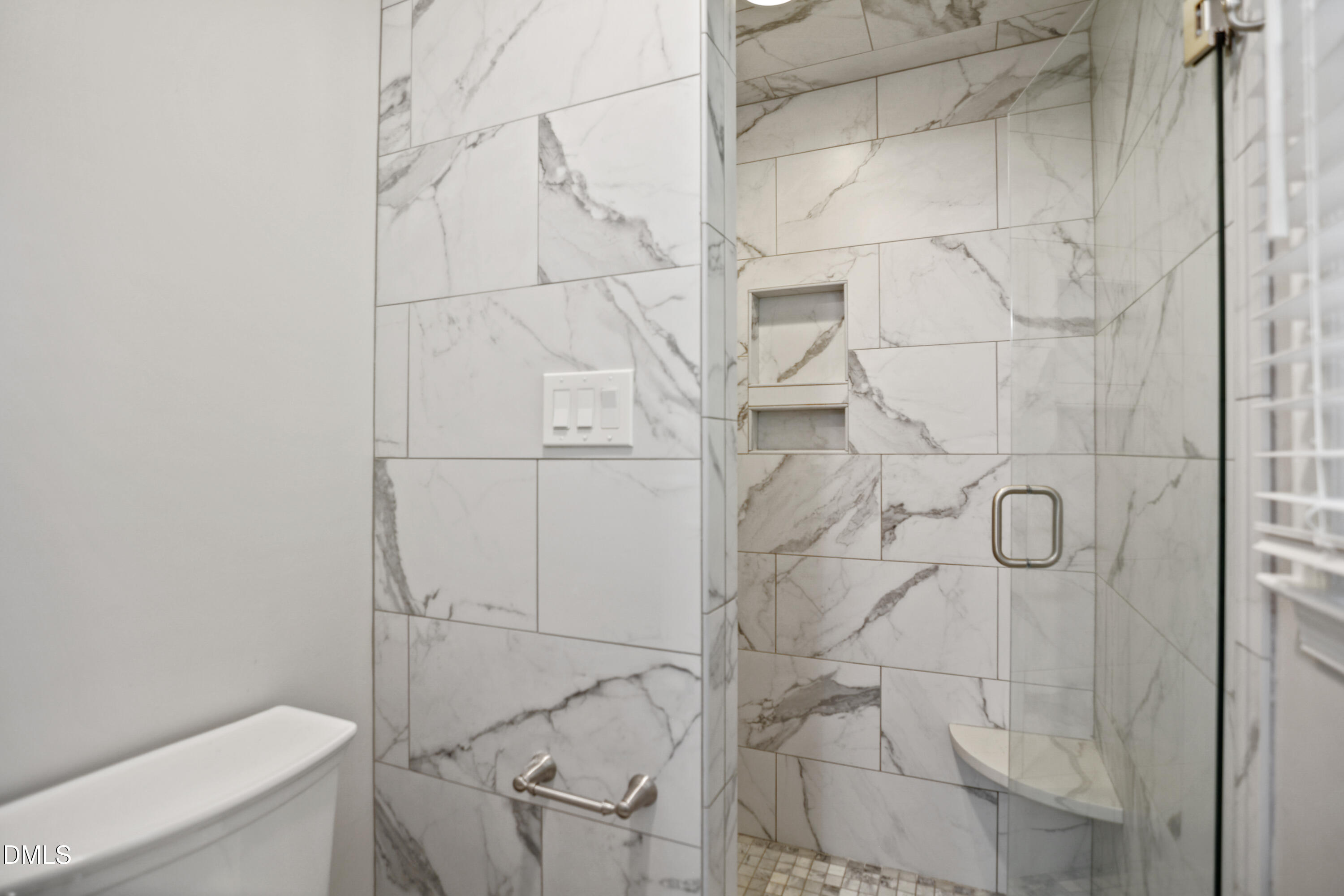 2704 Smokey Ridge Road Raleigh, NC 27613 - Photo 19 of 27 a bathroom with a shower