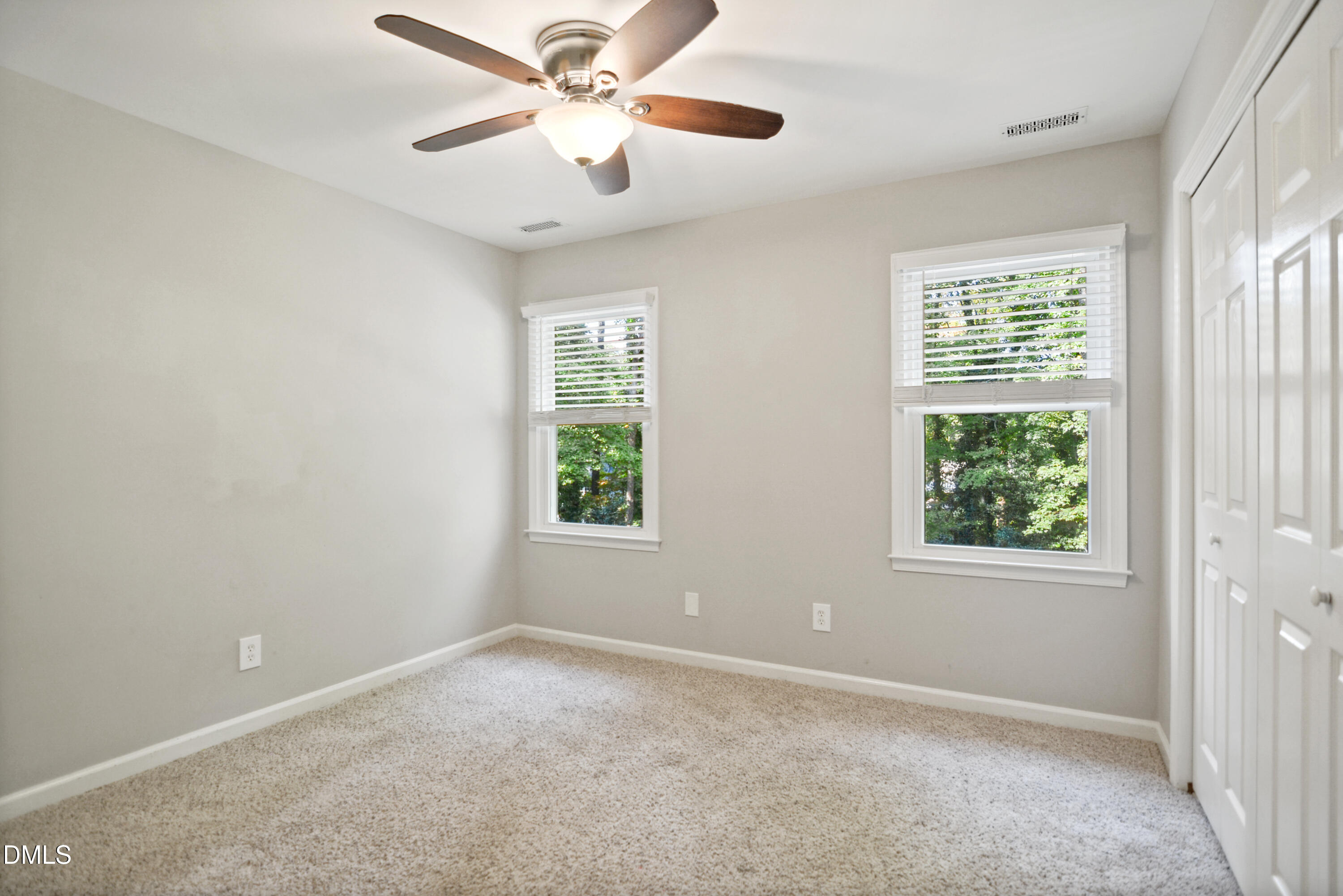 2704 Smokey Ridge Road Raleigh, NC 27613 - Photo 21 of 27 a view of an empty room with a window