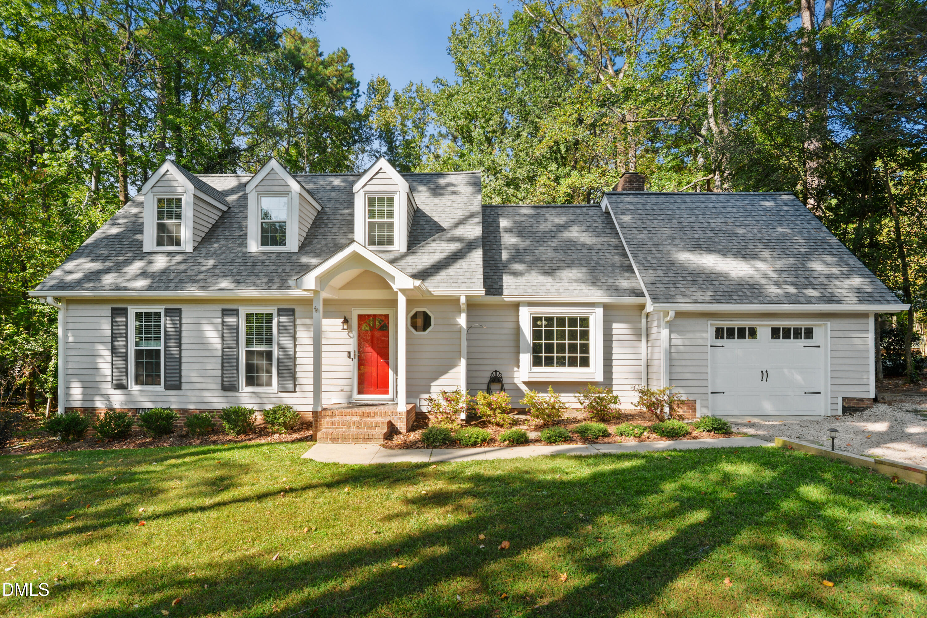 2704 Smokey Ridge Road Raleigh, NC 27613 - Photo 3 of 27 a front view of house with yard and green space