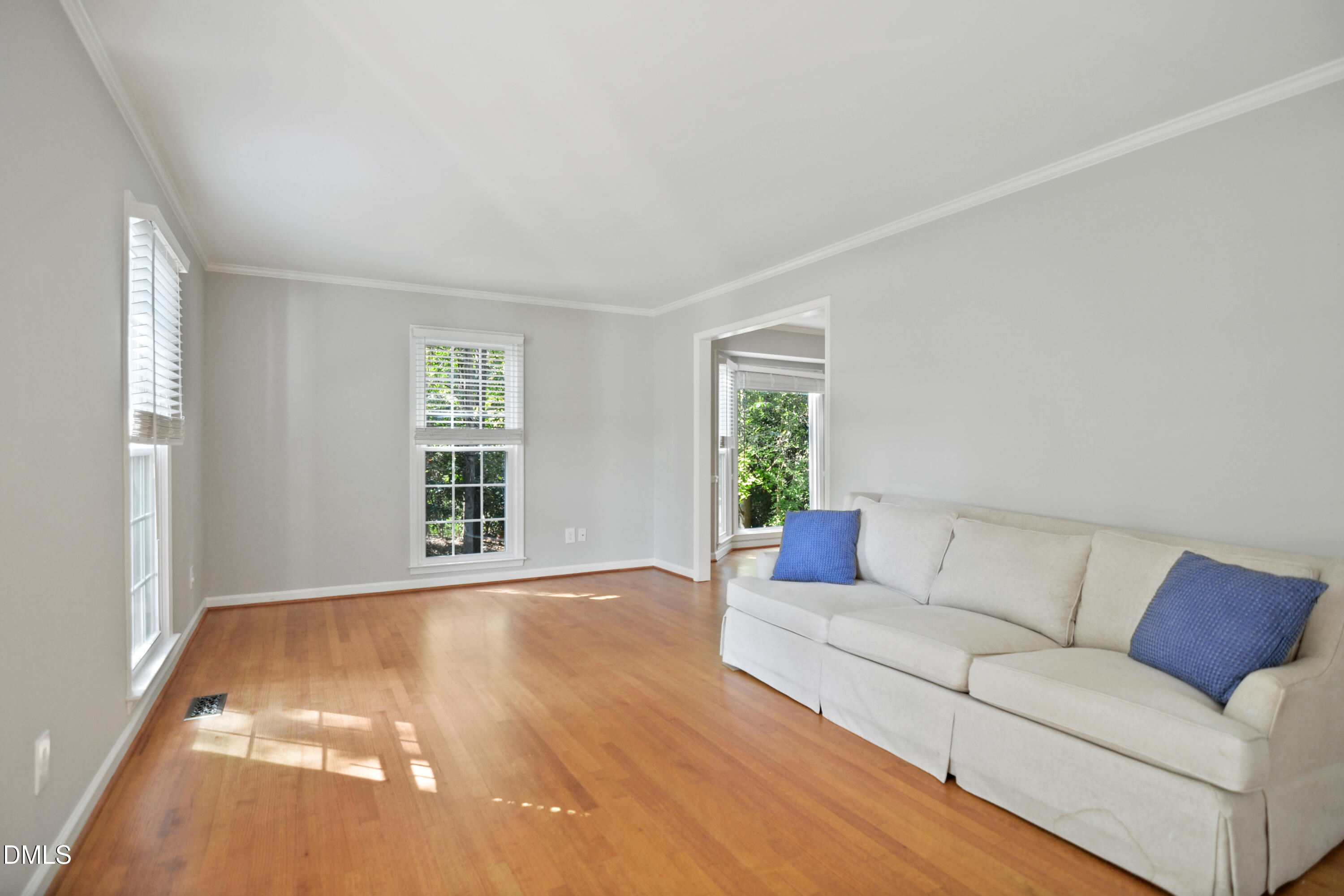 2704 Smokey Ridge Road Raleigh, NC 27613 - Photo 5 of 27 a living room with furniture and a window
