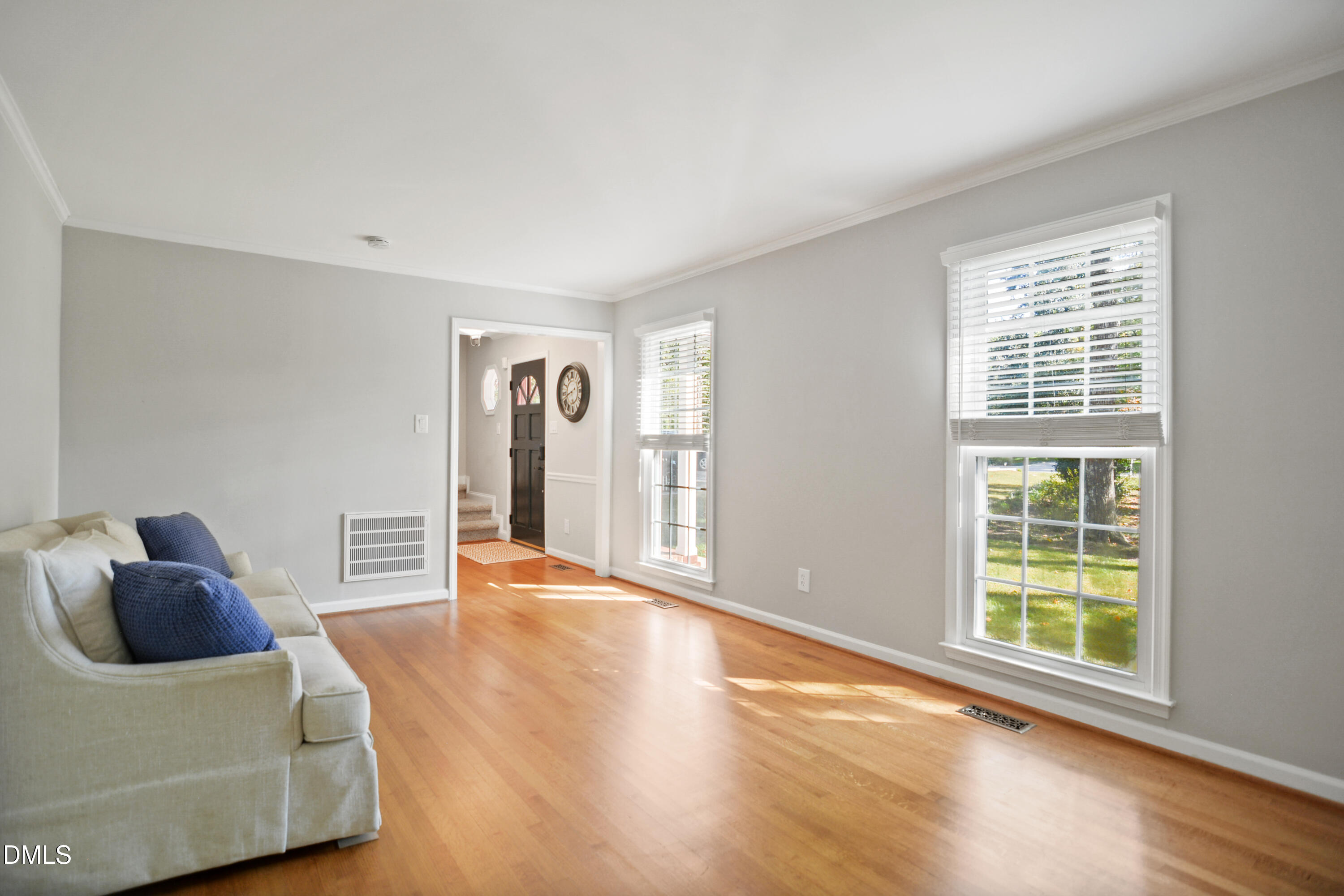 2704 Smokey Ridge Road Raleigh, NC 27613 - Photo 6 of 27 a view of livingroom with furniture and wooden floor