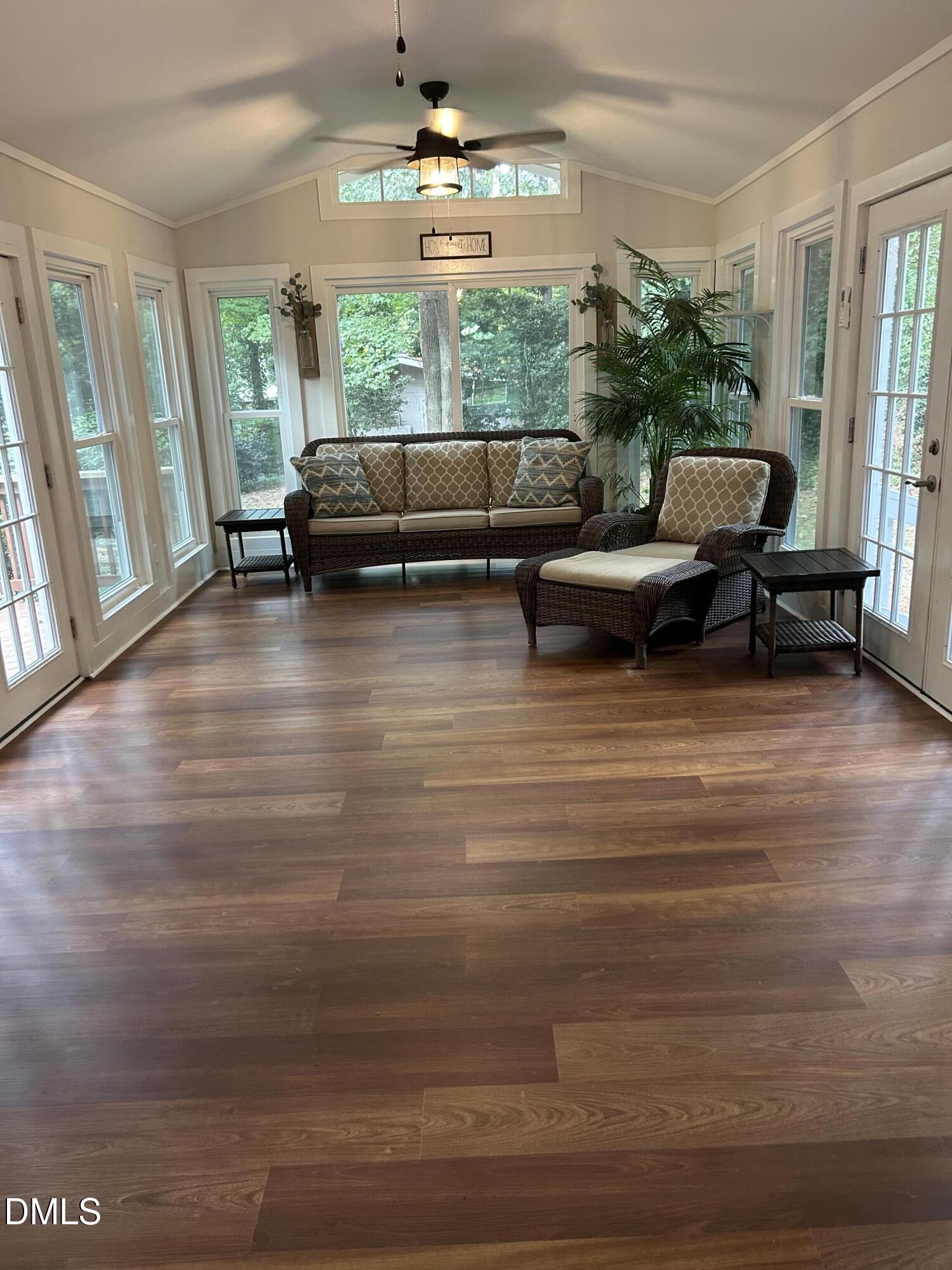 2704 Smokey Ridge Road Raleigh, NC 27613 - Photo 10 of 27 a living room with furniture and a large window