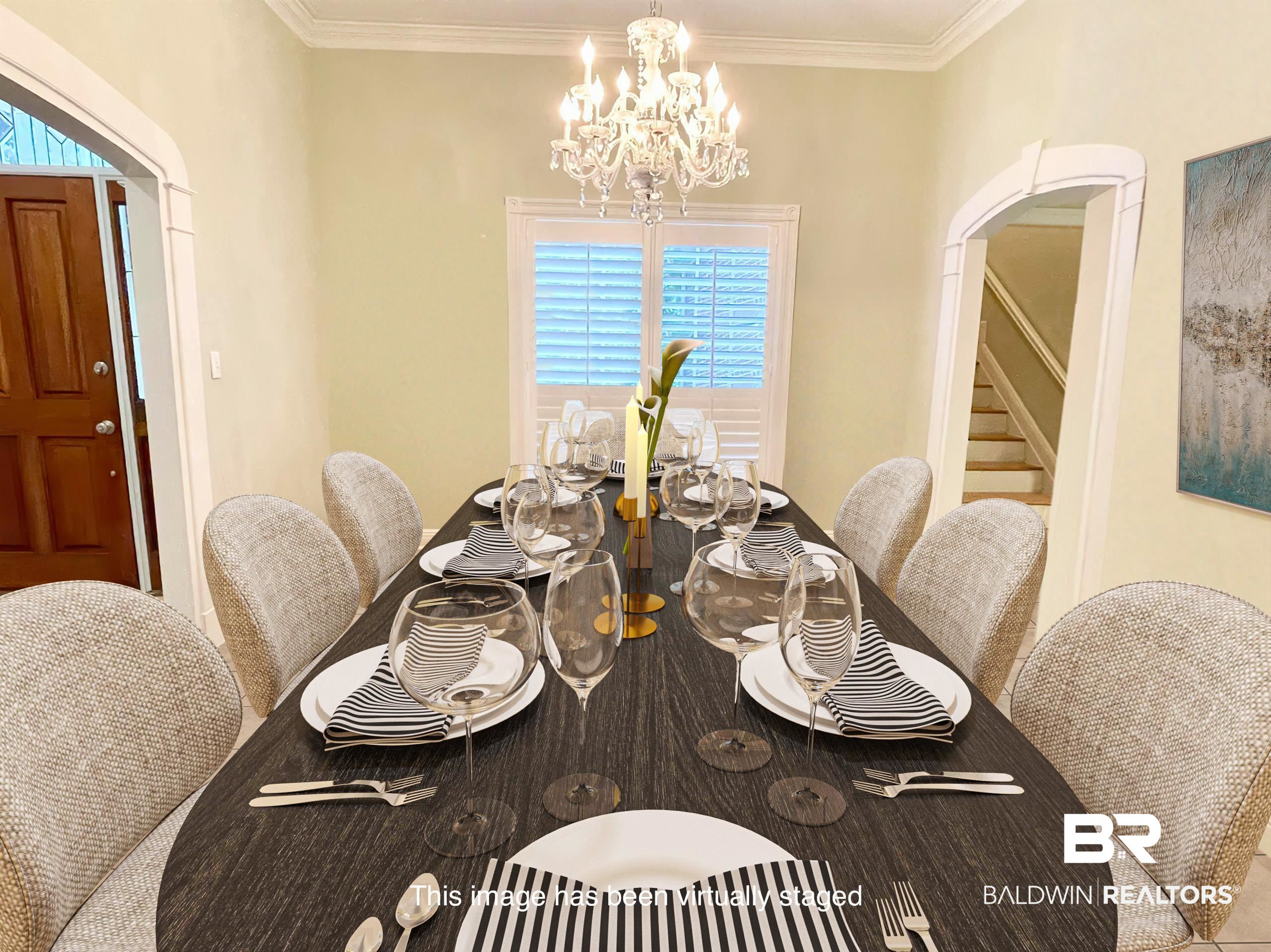 202 Potters Mills Road Daphne, AL 36526 - Photo 3 of 29 Dining space featuring ornamental molding and a chandelier