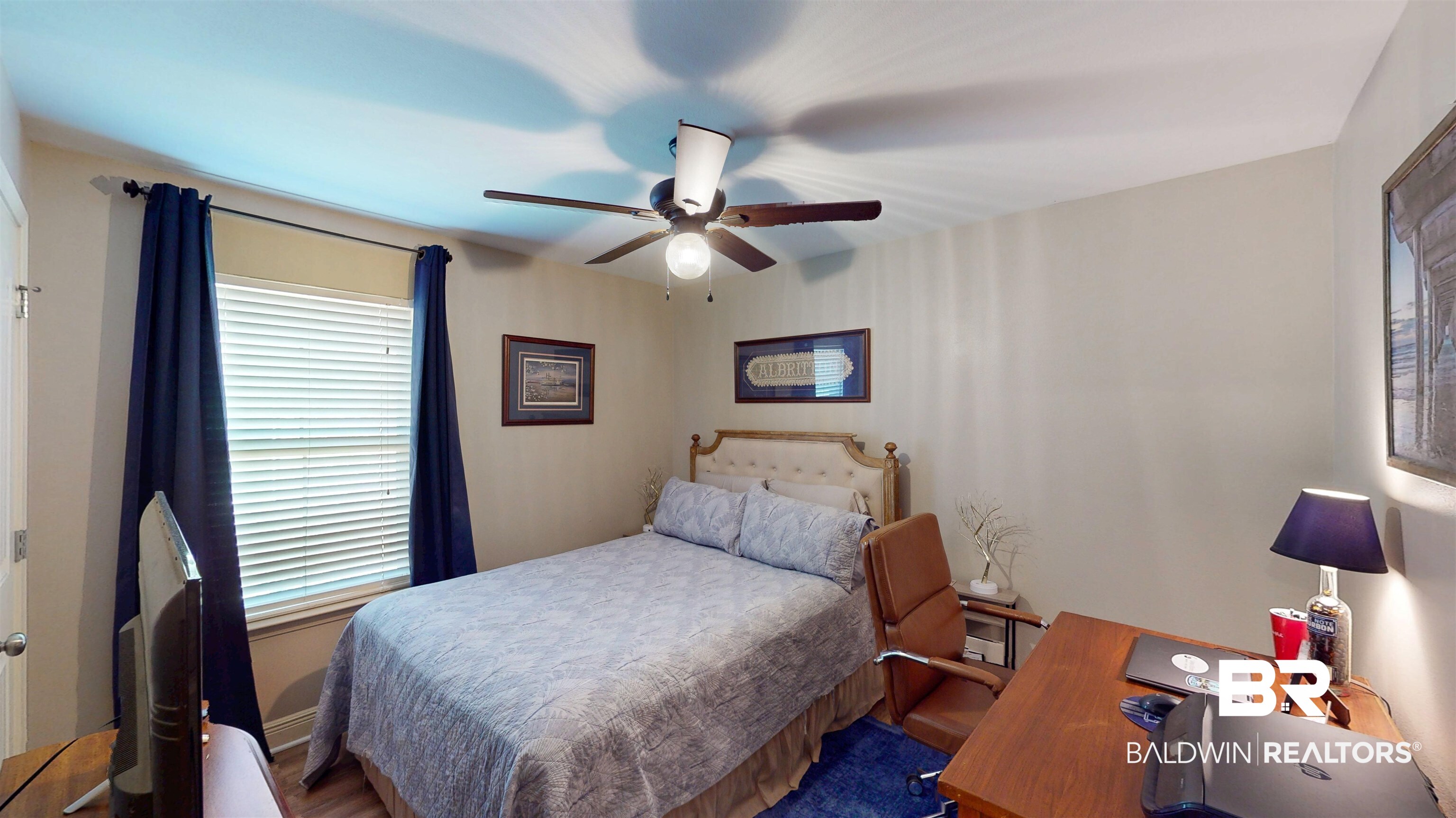 1304 Majesty Loop Foley, AL 36535 - Photo 17 of 44 Bedroom featuring ceiling fan, wood finished floors, and an office area