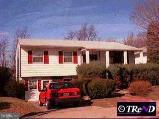 9716 Morefield Road Philadelphia, PA 19115 - Photo 1 of 1 a front view of a house with parking space