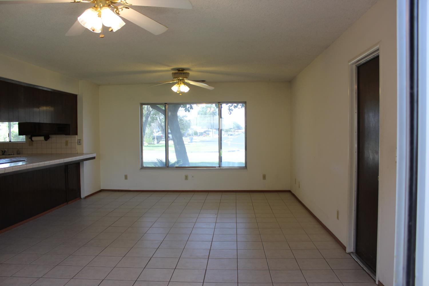 1985 Lynn Lane Hanford, CA 93230 - Photo 4 of 11 a view of an empty room with a window