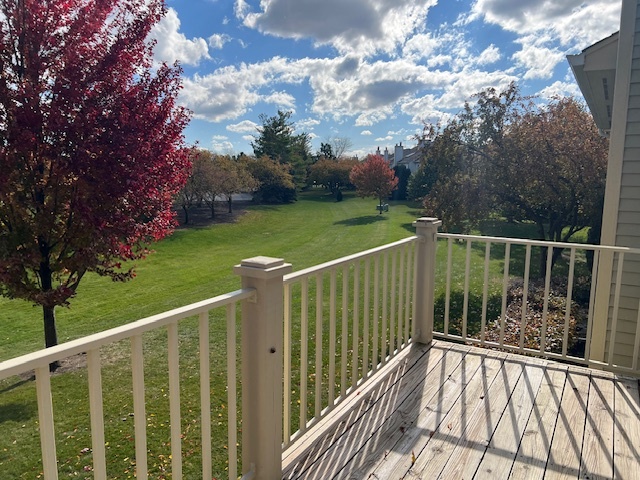 307 Glasgow Lane, Unit V2 Schaumburg, IL 60107 - Photo 13 of 15 a view of balcony with wooden floor and fence