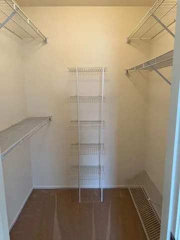 a view of a room with racks on the wall