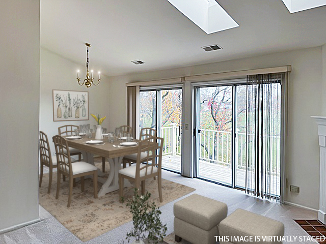 307 Glasgow Lane, Unit V2 Schaumburg, IL 60107 - Photo 5 of 15 a view of a dining room with furniture window and outside view