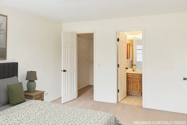 a bedroom with a bed and furniture