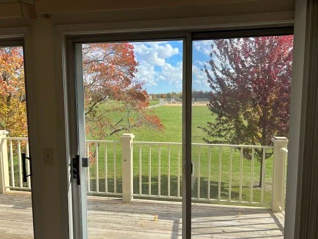 a view of a door and a room